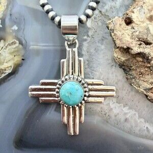 Sterling Silver Southwestern Style Rounded Mohave Turquoise Unisex Zia Pendant